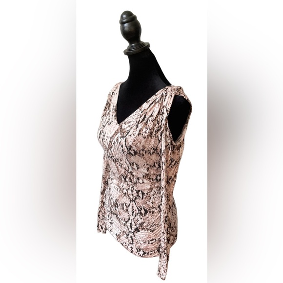 Jennifer Lopez: Brown and White Animal Print Cold Shoulder Blouse - Picture 8 of 17